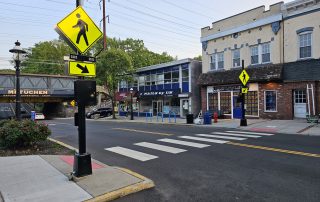 High visibility crosswalk with rectangular rapid flashing beacon